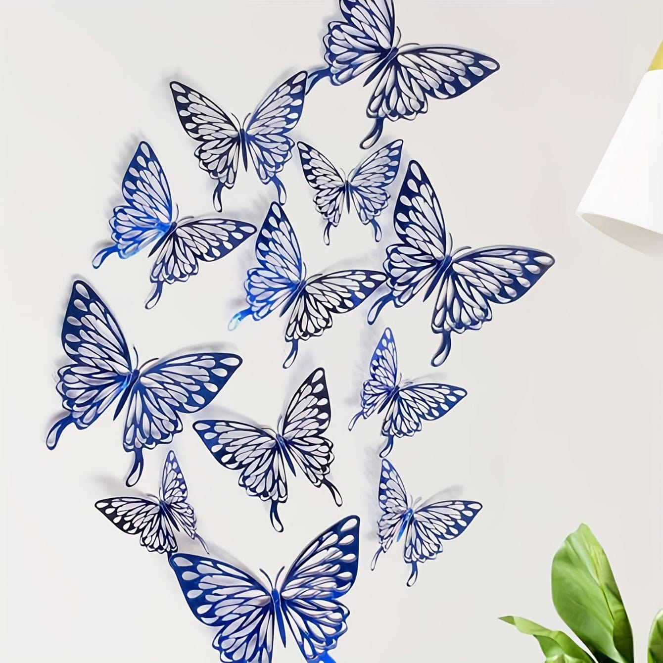 blue butterflys on white wall