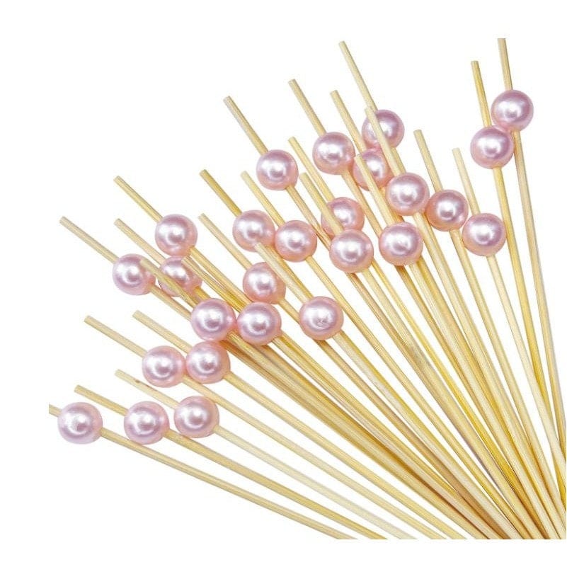 Pink pearls on bamboo sticks 