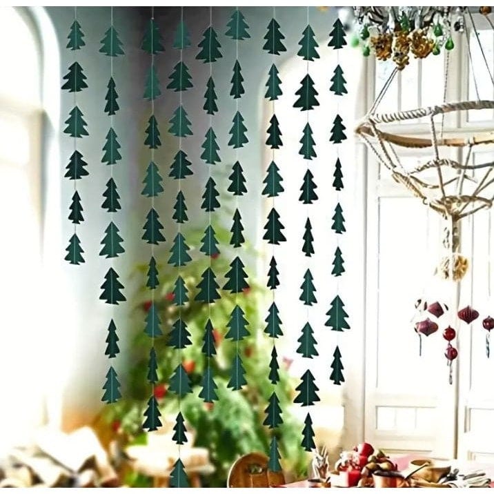 little Christmas tree garland as a backdrop by kitchen table