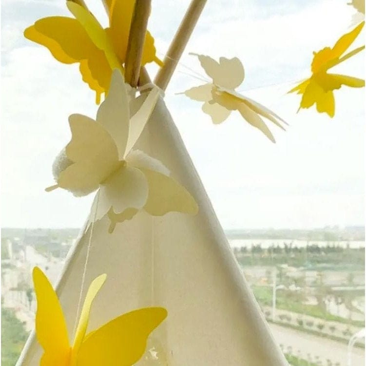 Yellow colored butterflies on a string