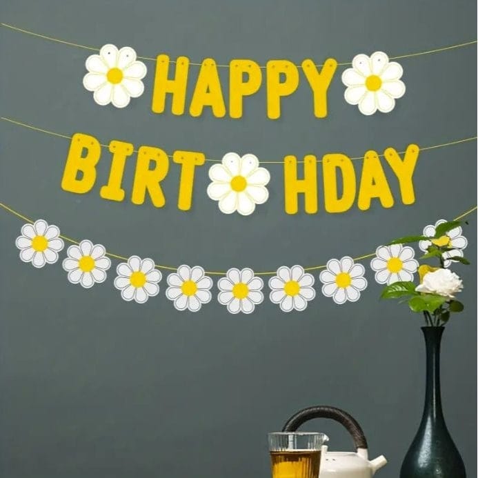 Yellow Happy Birthday banner with daisy's under it